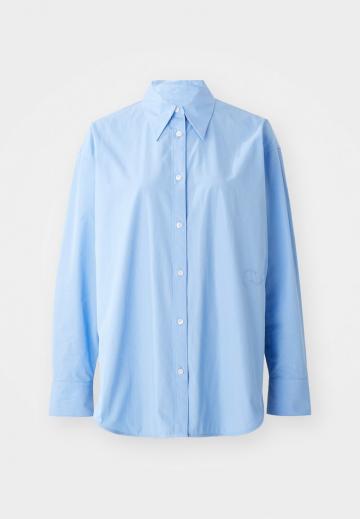 Длинная блузка