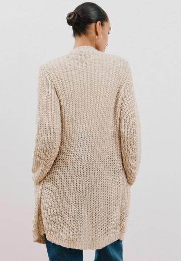 Длинный жилет