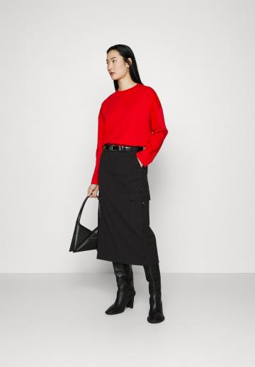 Юбка с накладными карманами