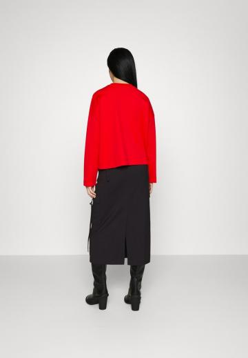 Юбка с накладными карманами