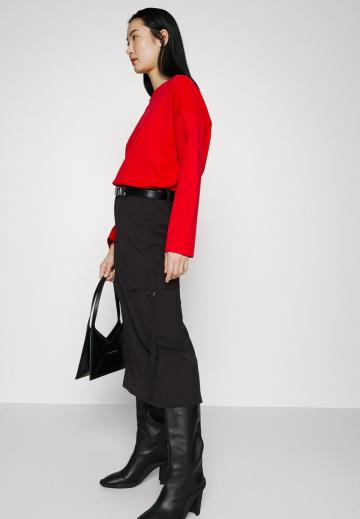 Юбка с накладными карманами