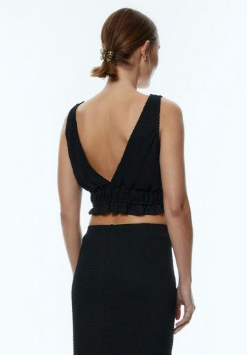 Блузка без рукавов