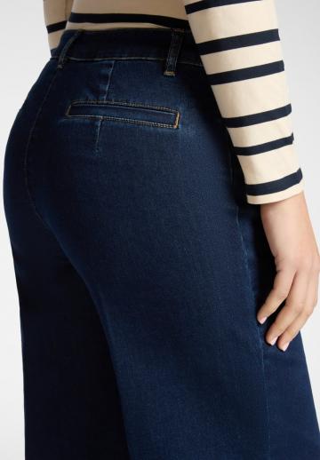 Клешеные джинсы