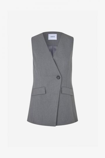 Длинный жилет