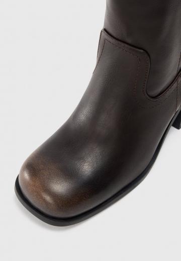 Высокие сапоги