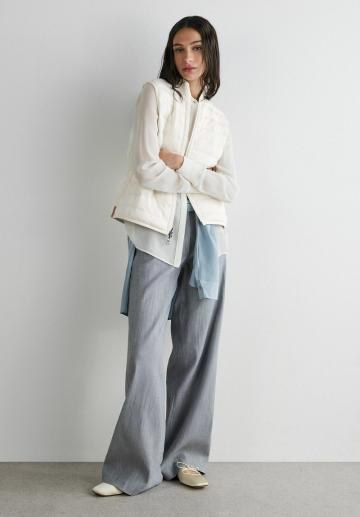 Пуховой жилет