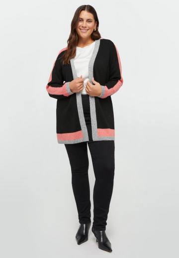 Длинный жилет