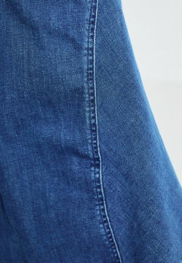 Клешеные джинсы