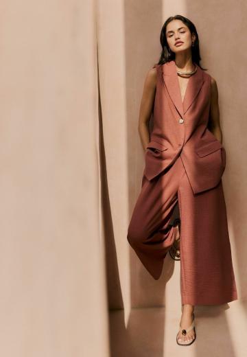 Длинный жилет