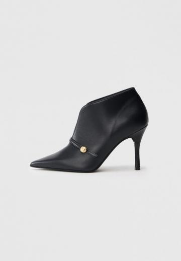 Высокие сапоги