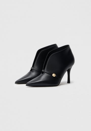 Высокие сапоги