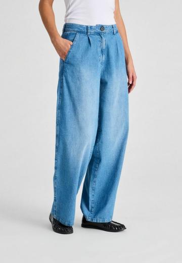 Клешеные джинсы