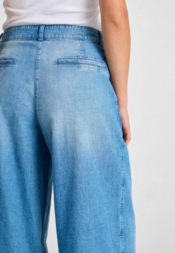 Клешеные джинсы