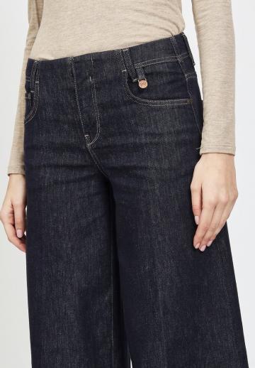 Клешеные джинсы