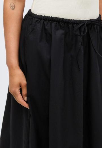 Юбка с накладными карманами