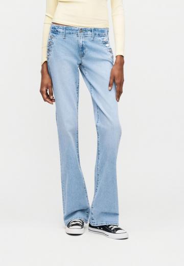 Клешеные джинсы