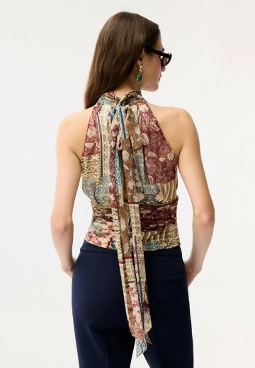 Блузка без рукавов