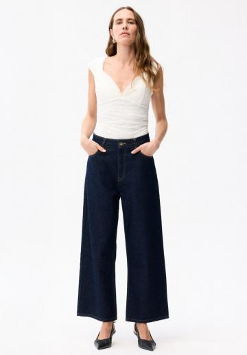 Клешеные джинсы