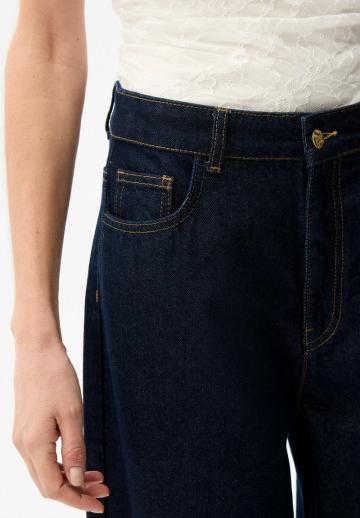 Клешеные джинсы