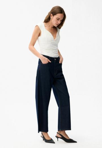 Клешеные джинсы