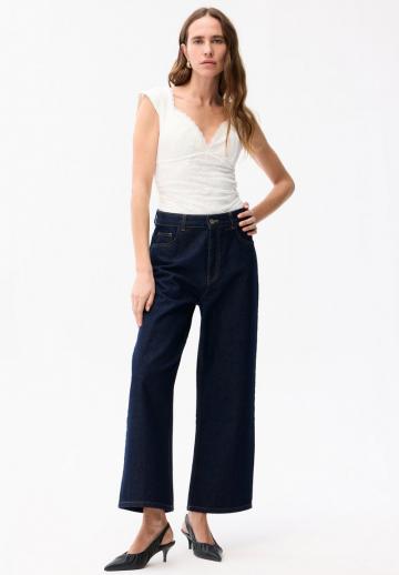 Клешеные джинсы