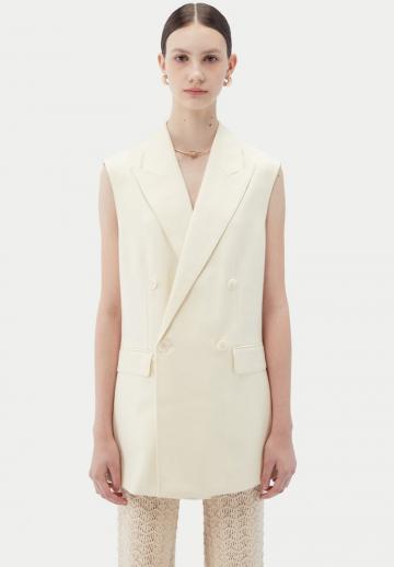 Длинный жилет