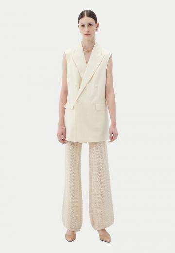 Длинный жилет