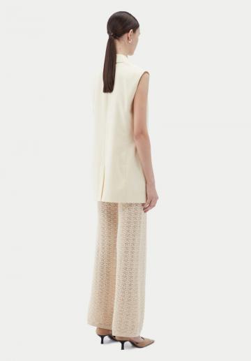 Длинный жилет