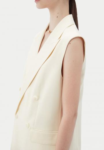 Длинный жилет