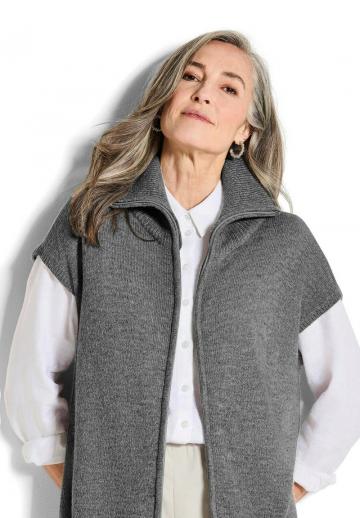 Длинный жилет