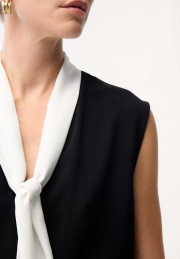 Блузка без рукавов