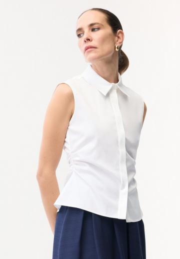 Блузка без рукавов