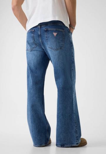 Клешеные джинсы