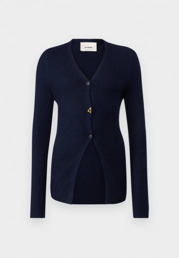 Длинный жилет