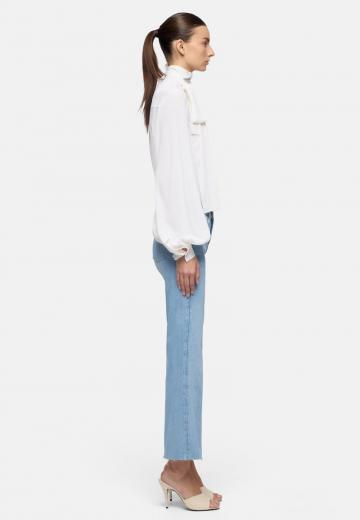 Клешеные джинсы