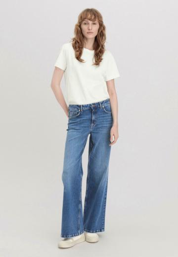 Клешеные джинсы