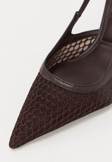 Туфли на высоком каблуке