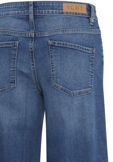 Клешеные джинсы