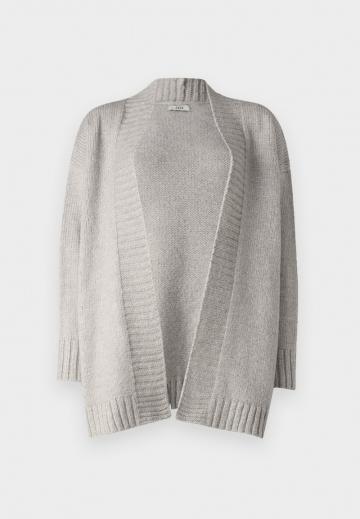 Длинный жилет