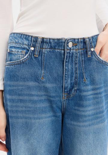 Клешеные джинсы