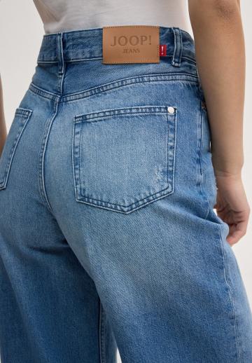 Клешеные джинсы