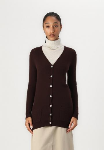 Длинный жилет