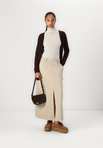 Длинный жилет