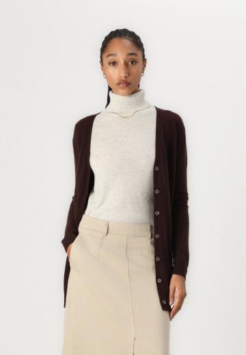 Длинный жилет