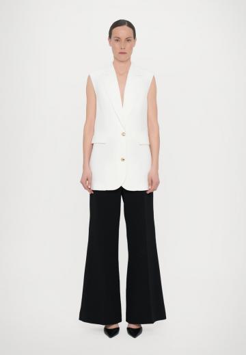 Длинный жилет