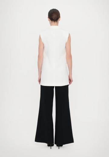 Длинный жилет