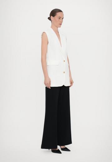 Длинный жилет