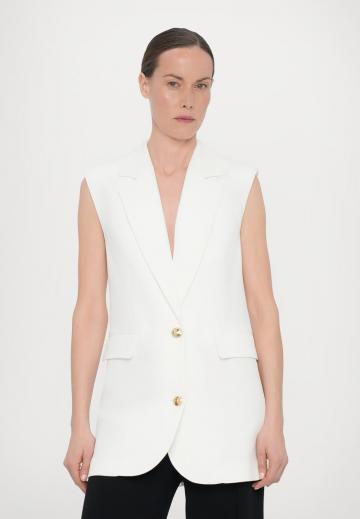 Длинный жилет