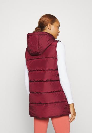 Длинный жилет