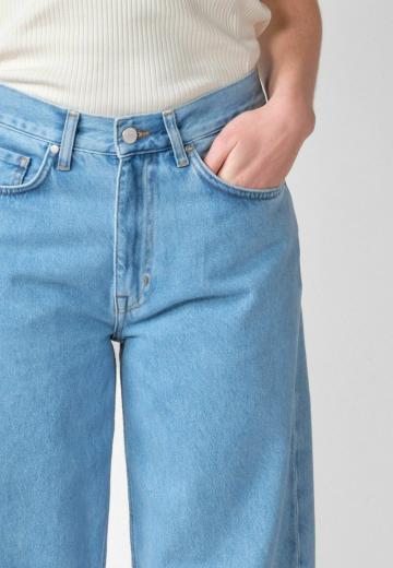 Клешеные джинсы